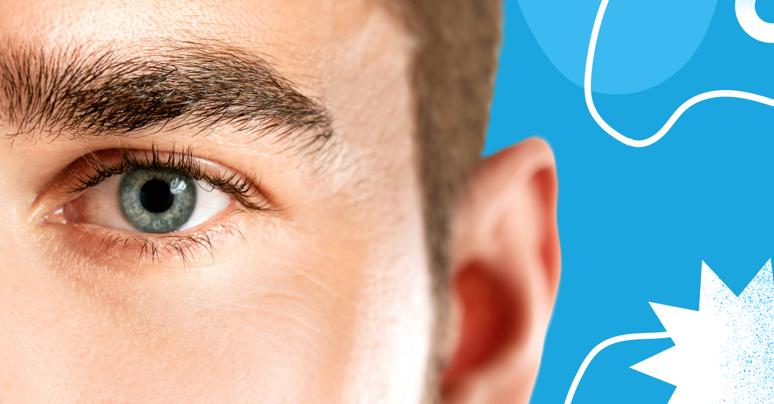 A photo of a man with half of his face visible, showing a blue eye